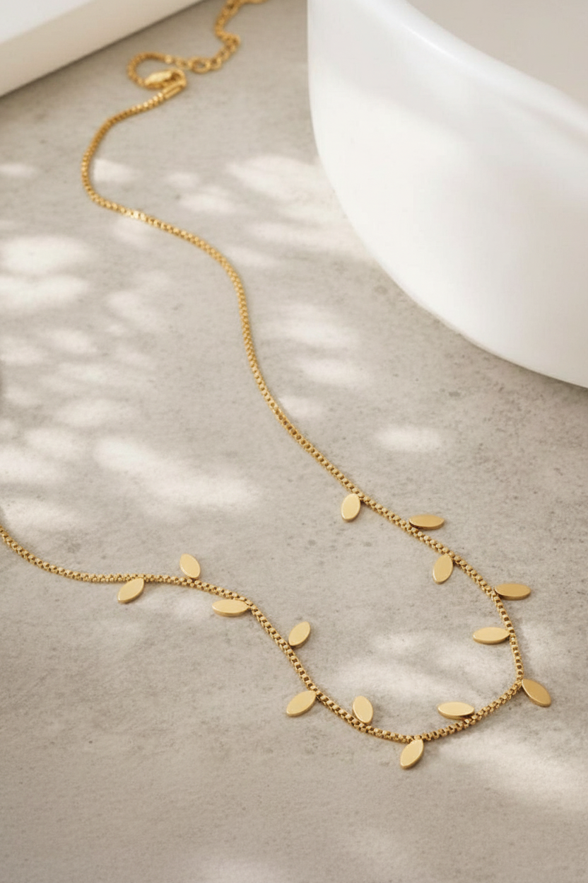 Leaf Necklace Gold Flat Lay