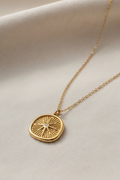 Necklace on linen