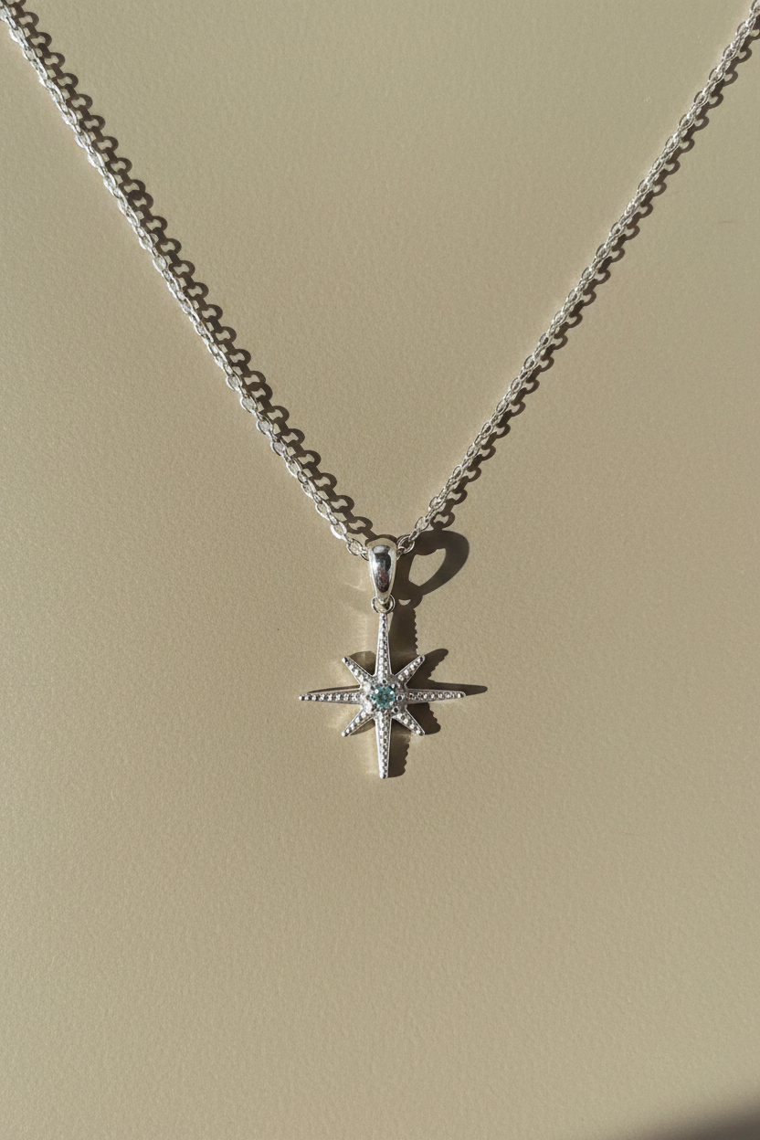 Silver Star Pendant Necklace Flat Lay